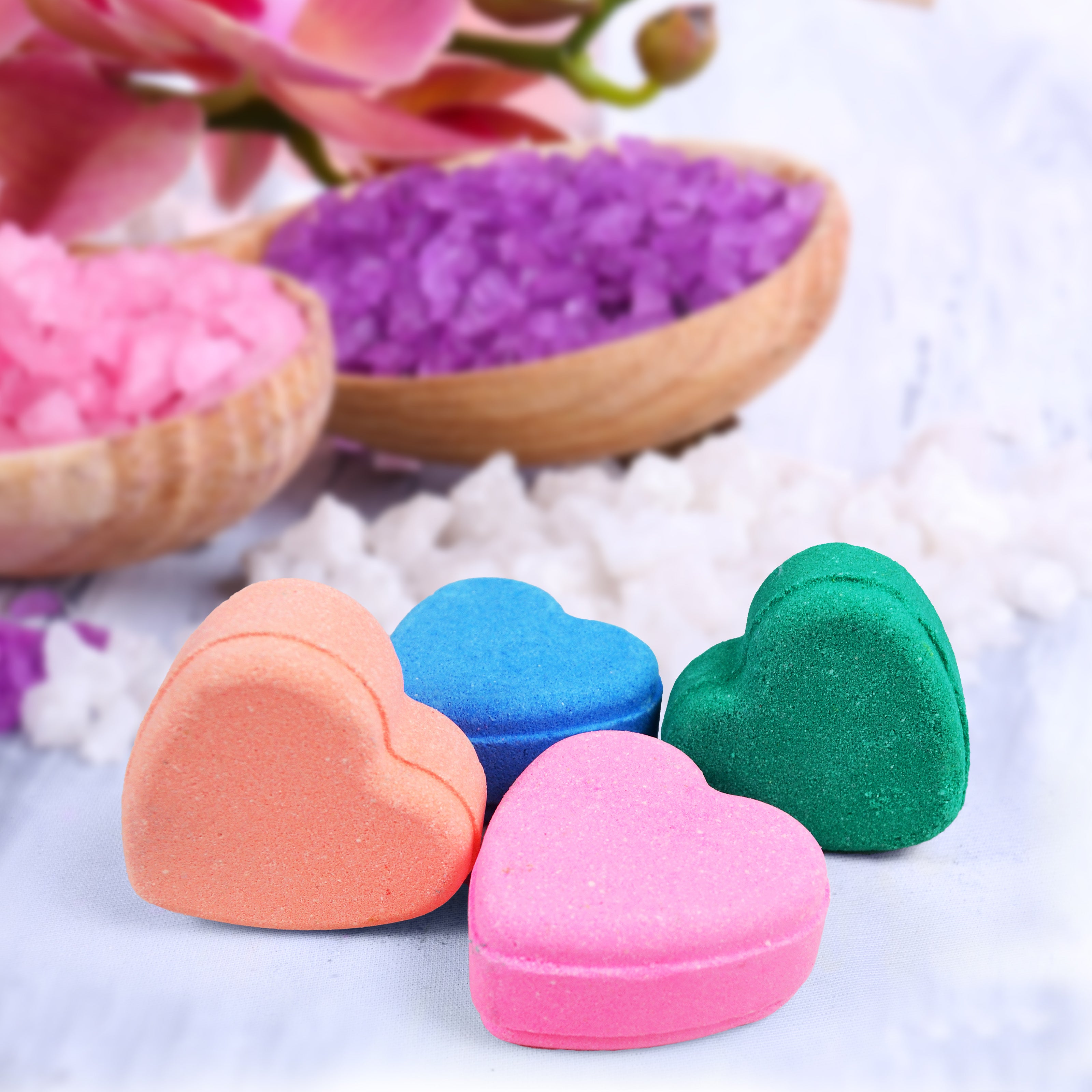 Pastel heart bath bombs with peachy blush, tangy orange, aqua and lemongrass (each 60 gm )
